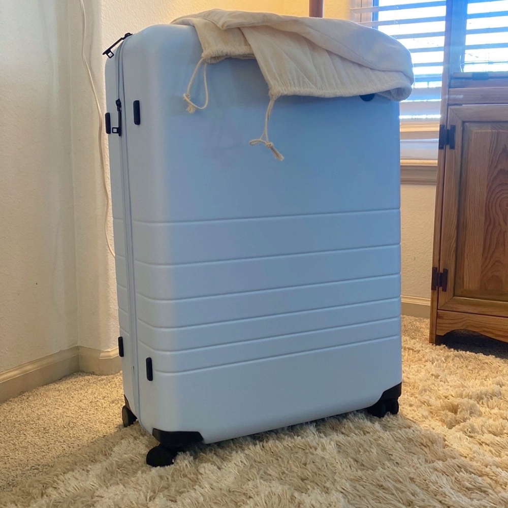 Baby Blue Large Hard Shell Rolling Luggage